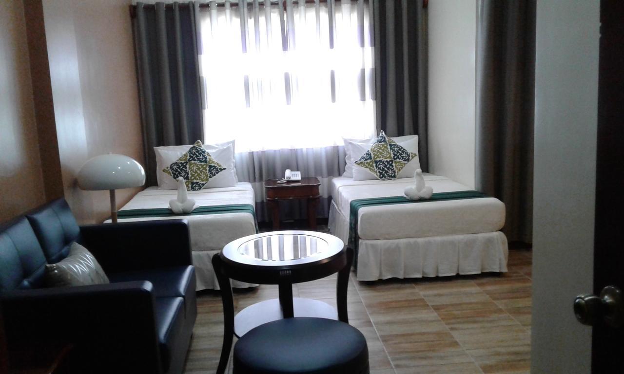 Hotel Charos Dormitel Dumaguete City Esterno foto