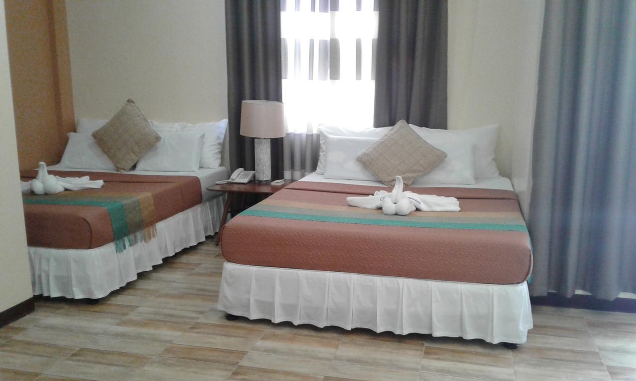 Hotel Charos Dormitel Dumaguete City Esterno foto