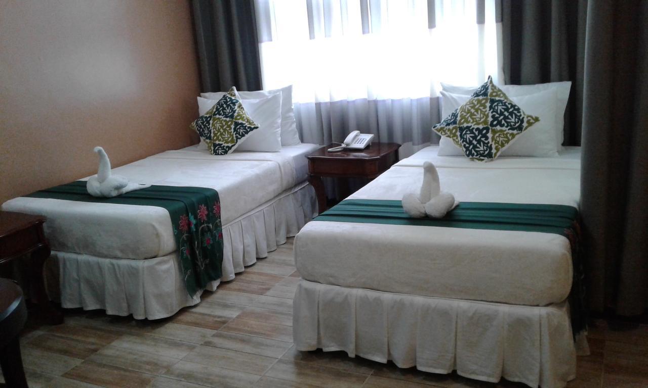 Hotel Charos Dormitel Dumaguete City Esterno foto
