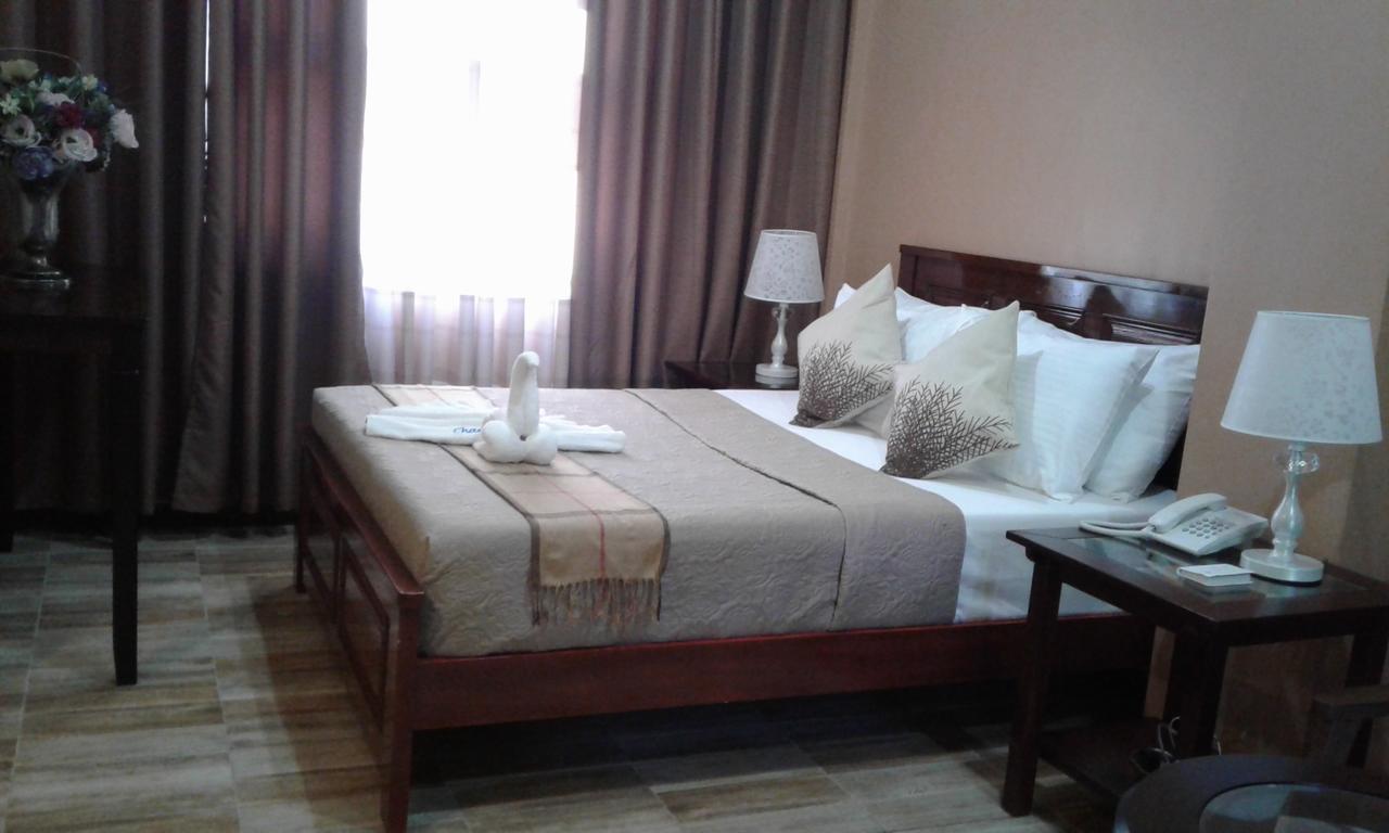 Hotel Charos Dormitel Dumaguete City Esterno foto