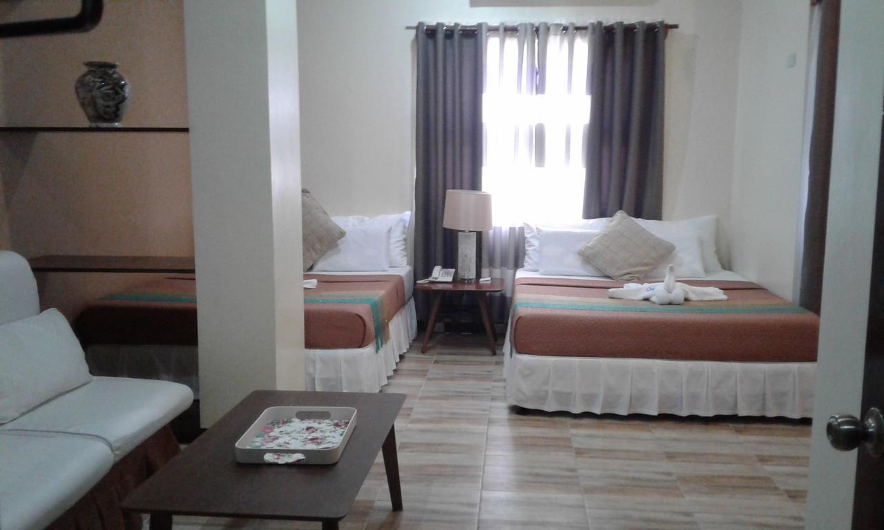 Hotel Charos Dormitel Dumaguete City Esterno foto