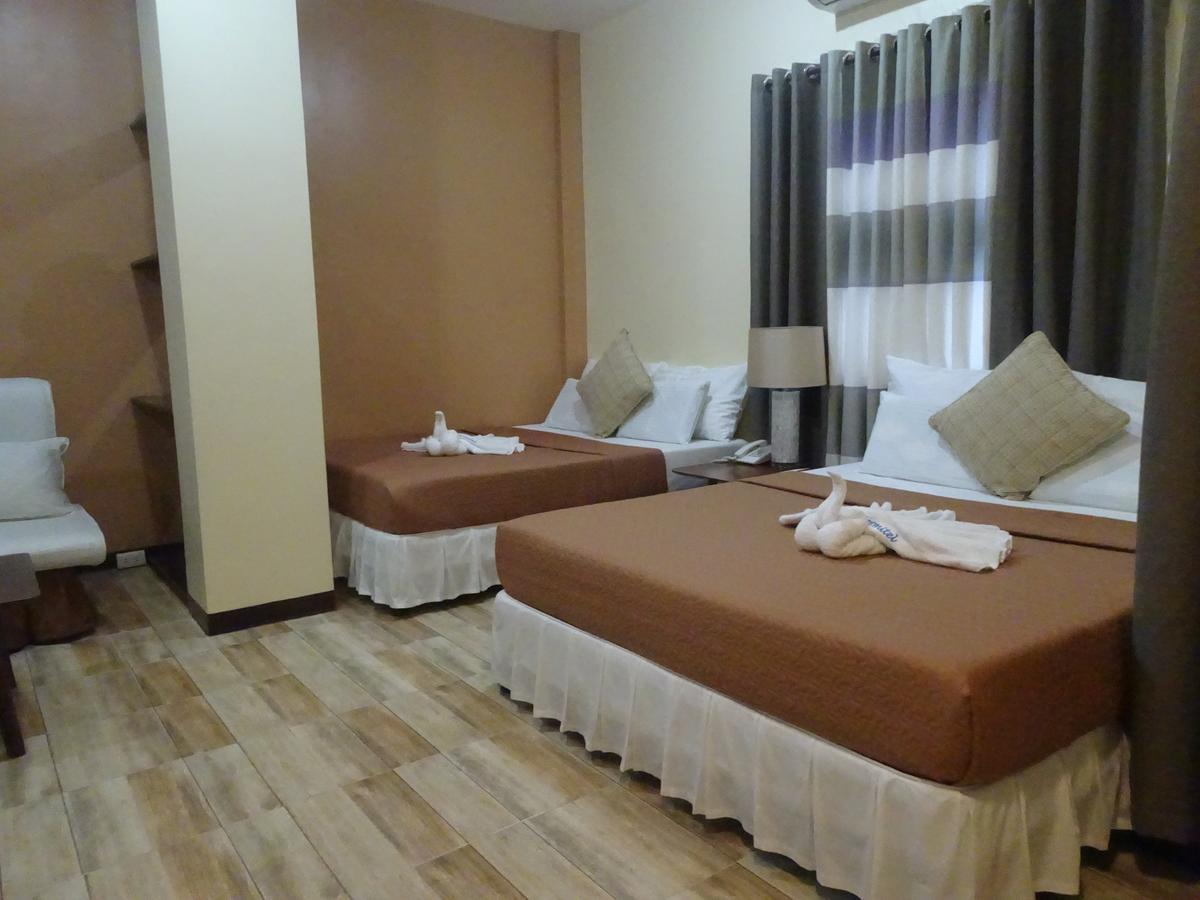 Hotel Charos Dormitel Dumaguete City Esterno foto
