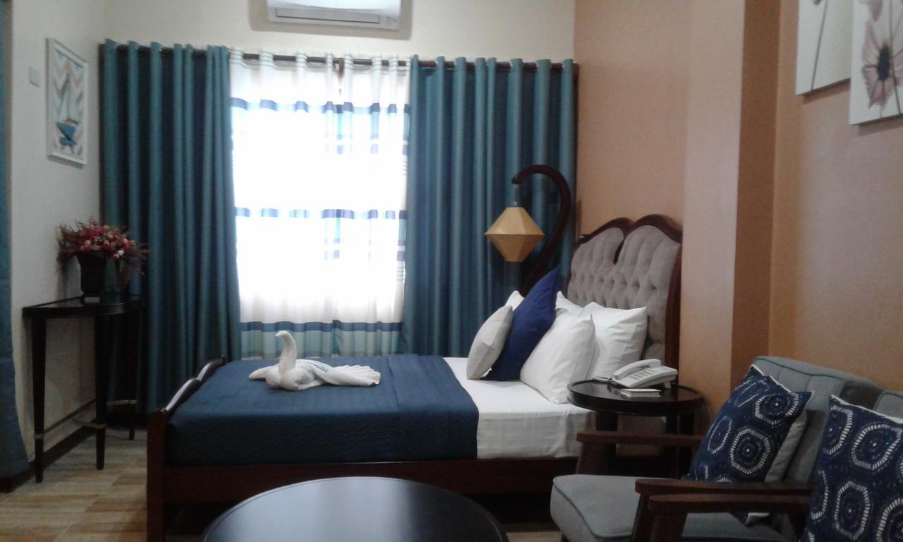 Hotel Charos Dormitel Dumaguete City Esterno foto
